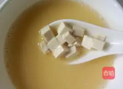 Illustration of how to make steamed egg custard with minced meat and tofu 4