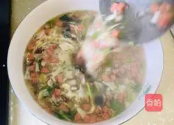 Illustration of how to make preserved egg and tofu soup 10