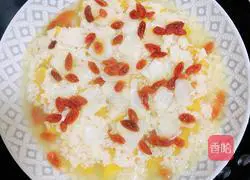 Illustration of how to make steamed pumpkin with rice wine and lilies 8