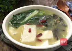 Illustration of how to make preserved egg and tofu soup 13