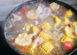 Illustration of how to make carrot, corn, yam and pork ribs soup 13