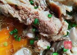 Illustration of how to make carrot and lotus root slices bone soup 9