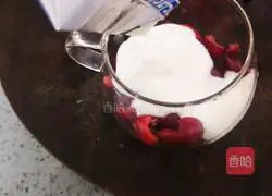 Illustration of how to make cherry oatmeal yogurt cup 6