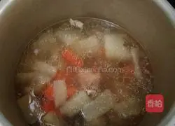 Illustration of how to make pork ribs, winter melon and carrot soup 6