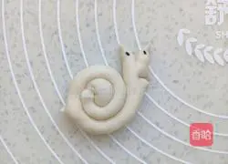 Illustration of how to make snail steamed buns 8