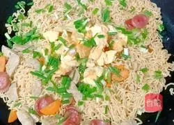 Illustration of how to make fried instant noodles with meatballs and sausages 17