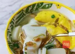 Illustration of how to make egg dumplings and rice cake soup 12
