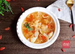 Illustration of how to make wolfberry rock sugar and white fungus soup 12