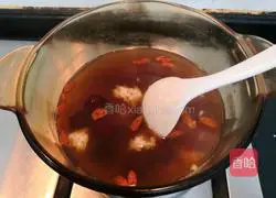 Wolfberry fermented rice wine Illustration of how to make meatball soup 18