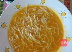 Illustration of how to make long noodles with pumpkin soup for food supplement 5
