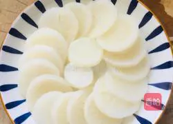 Illustration of how to make steamed radish with scallops 3