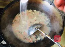 Illustration of how to make preserved egg and tofu soup 6