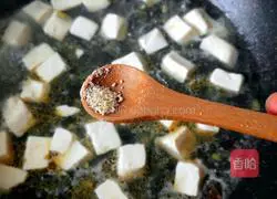 Illustration of how to make preserved egg and tofu soup 12