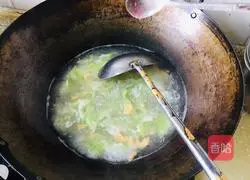 Illustration of how to make lettuce and sea rice soup 8