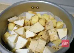 Illustration of how to make steamed potato and taro ribs 6