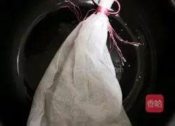 Illustration of how to make squid and dried beans in pot 1