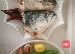 Illustration of how to cook fish head in dry pot 1