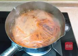 Illustration of how to make asparagus, carrot and fried shredded pork 6