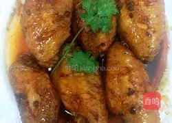 Illustration of how to make chicken wings stuffed with black soy sauce and wine 6