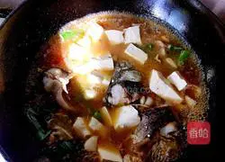 Illustration of how to make crucian carp stewed with tofu 6