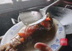 Illustration of how to make steamed fish 11