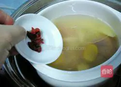 Illustration of how to make yam stewed pig's trotters 11