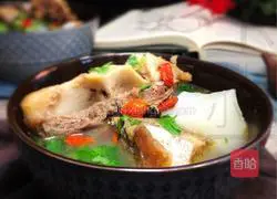 Illustration of how to cook ox tail bone and radish stew 14