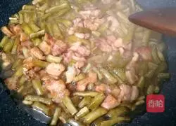 Illustration of how to make fried pork belly with sour beans 5