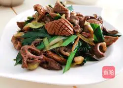 Illustration of how to stir-fry pork heart and kidneys with garlic sprouts 14