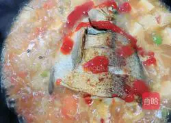 Illustration of how to make fish head stew with tomato sauce 15