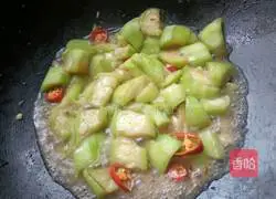 Illustration of how to make stir-fried pork slices with loofah 8