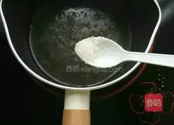 Illustration of how to fry mushroom slices and steam tofu 6