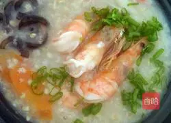 Illustration of how to make seafood scallop oatmeal porridge 13