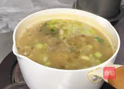 Illustration of how to make shrimp, fungus and millet porridge 10