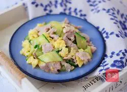 Illustration of how to make fried pork slices with cucumber and eggs 16