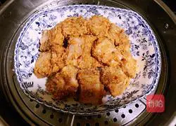 Illustration of how to make steamed pork ribs with Sichuan flavor rice flour 8