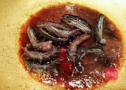 Illustration of how to cook sea cucumber with green onion 7