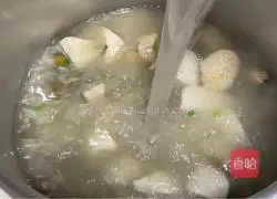 Illustration of how to make baby abalone and taro porridge 11