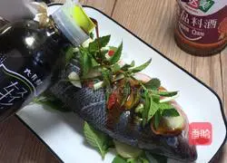 Illustration of how to make steamed seabass with mint 9