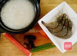 Illustration of how to make seafood and scallop oatmeal porridge 1