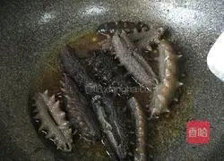 Illustration of how to cook sea cucumber with green onions 14