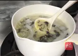 Illustration of how to make shrimp, fungus and millet porridge 7
