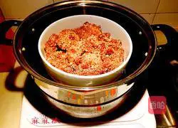 Illustration of how to make steamed pork ribs and lotus root 12