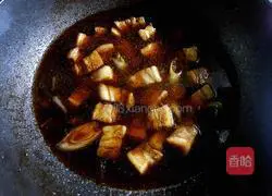 Illustration of how to cook braised pork with eggs 6