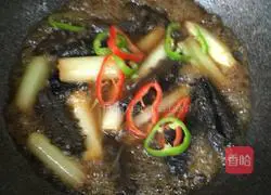 Illustration of how to cook sea cucumber with green onions 19
