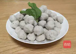 Illustration of how to dip fish balls in tomato sauce 15