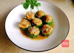 Illustration of how to make steamed scallops with loofah 18