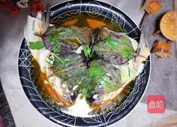 Illustration of how to make steamed fish head with perilla 16