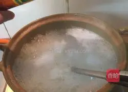 Illustration of how to make scallop and seafood porridge 2