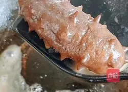 Illustration of how to cook sea cucumber with green onions 11